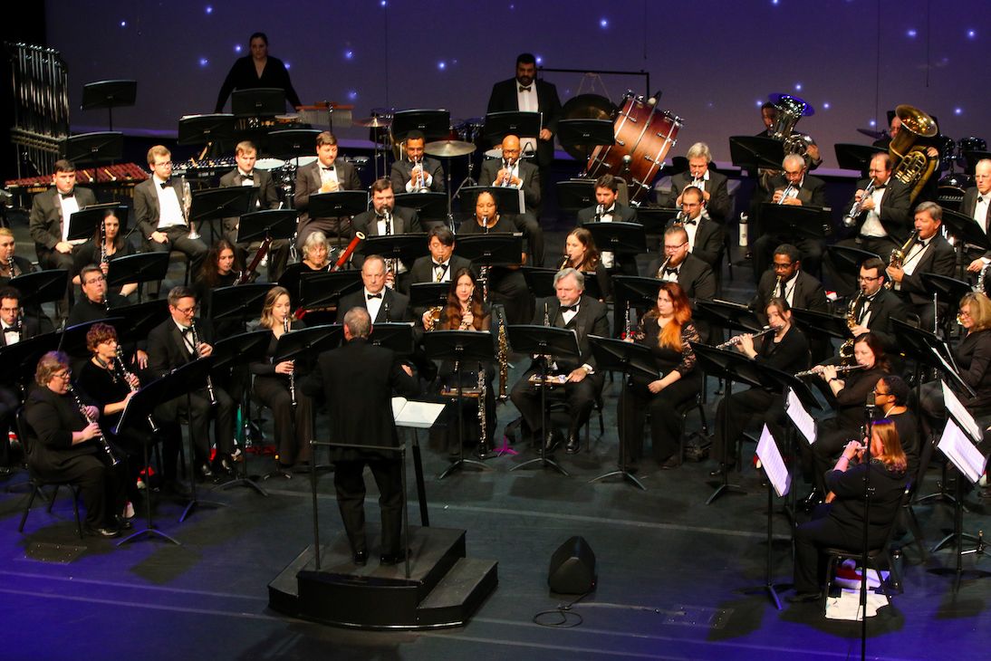 The full band on a starlit stage at the Music of the Season concert